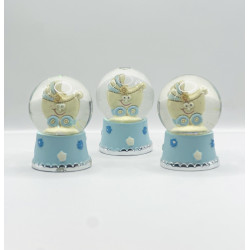 glass globe with ababy stroller inside